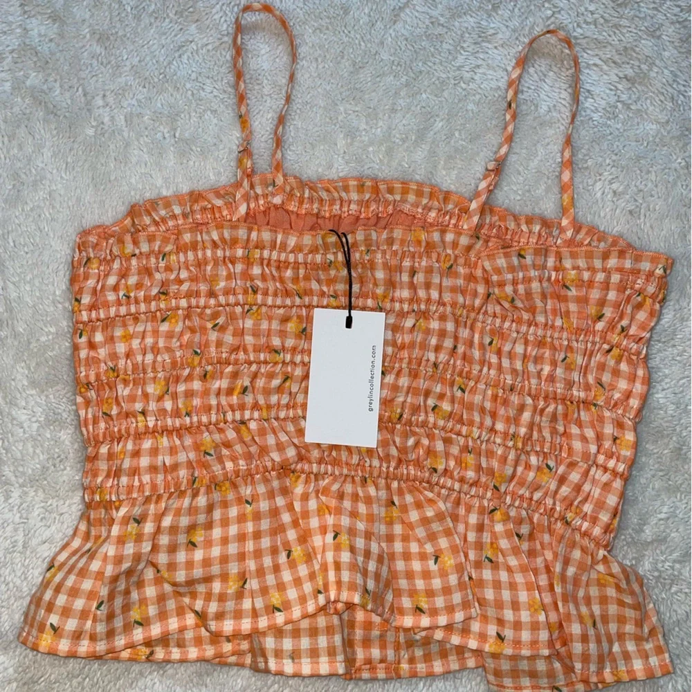 Greylin Orange Smocked Peplum Crop Top with Yellow Flower Pattern Detail - Picture 4 of 6